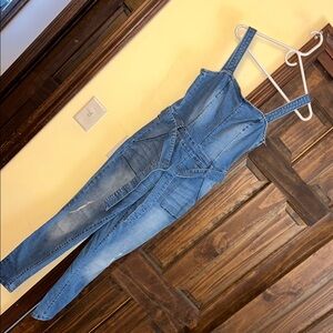 Bebe Blue Denim Jumpsuit with Fitted Silhouette